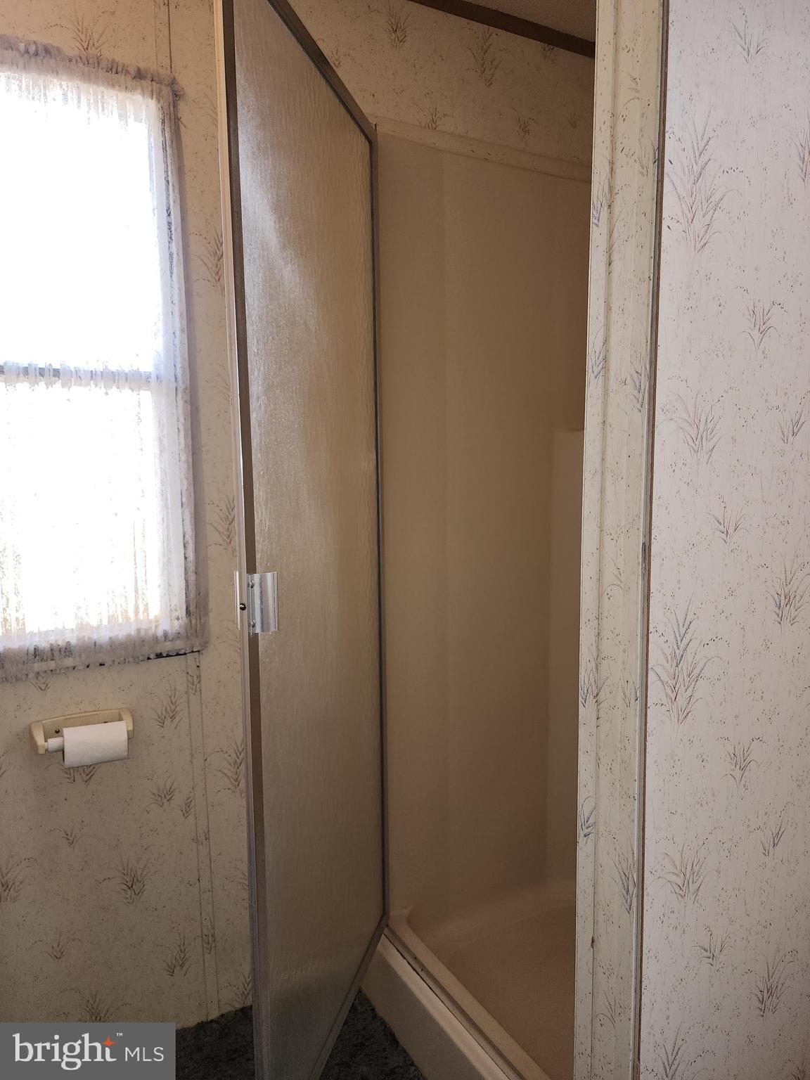 109 Neil Road Shippensburg, PA 17257 - Photo 36 of 62 a bathroom with a glass shower door
