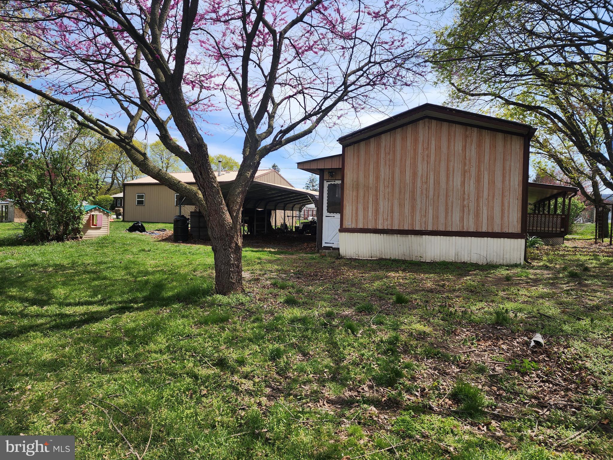 109 Neil Road Shippensburg, PA 17257 - Photo 45 of 62 a small garden covered with tall trees