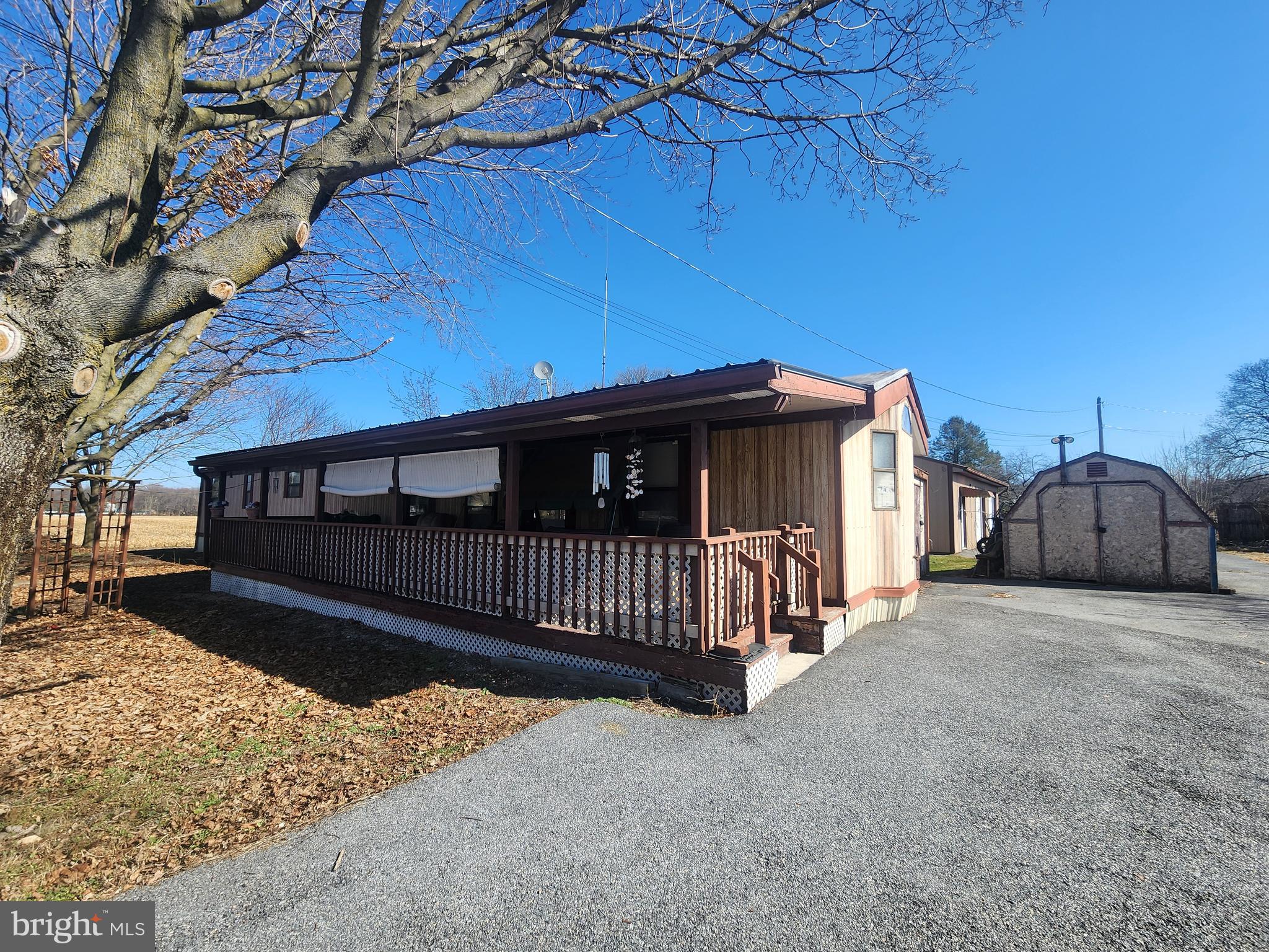 109 Neil Road Shippensburg, PA 17257 - Photo 5 of 62 a view of a house with a yard and wooden fence