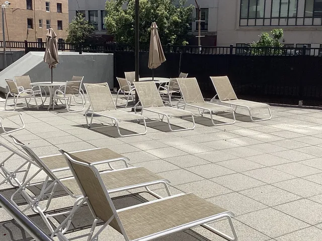 a view of a terrace with furniture