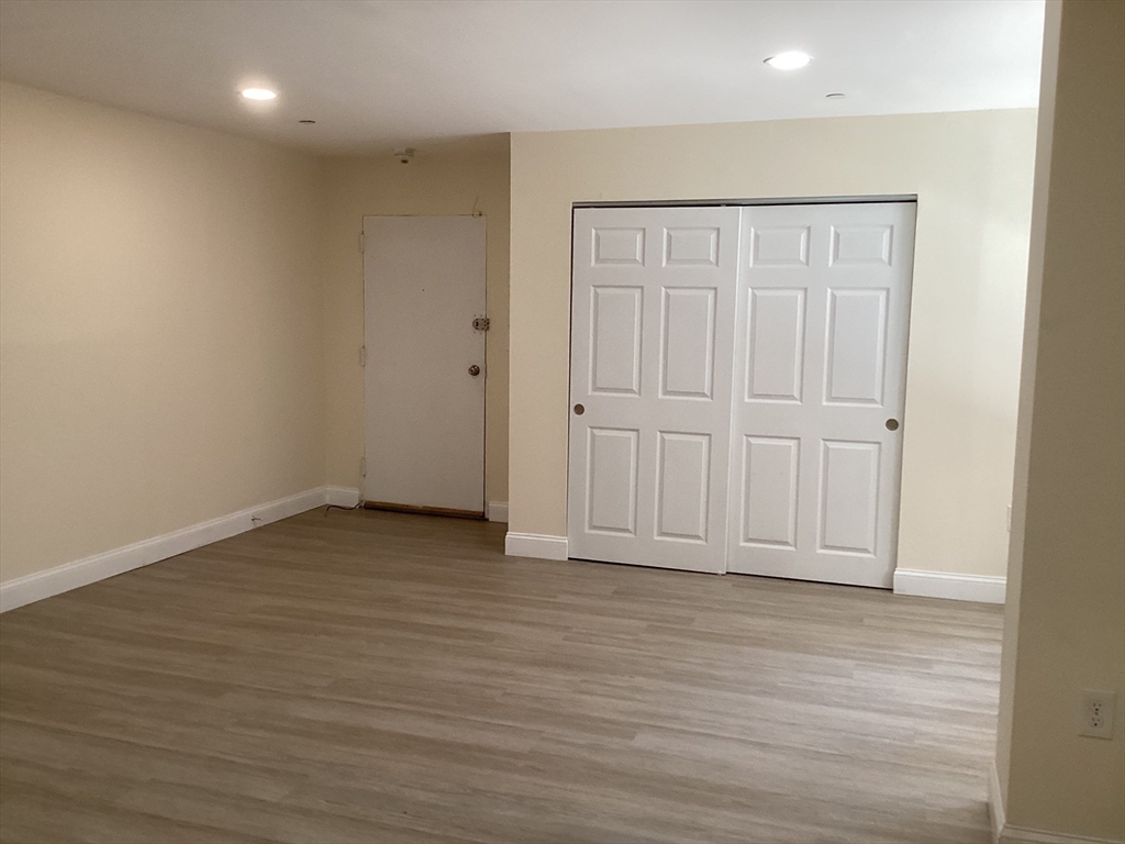 566 Commonwealth Avenue, Unit 101 Boston, MA 02215 - Photo 6 of 17 a view of empty room