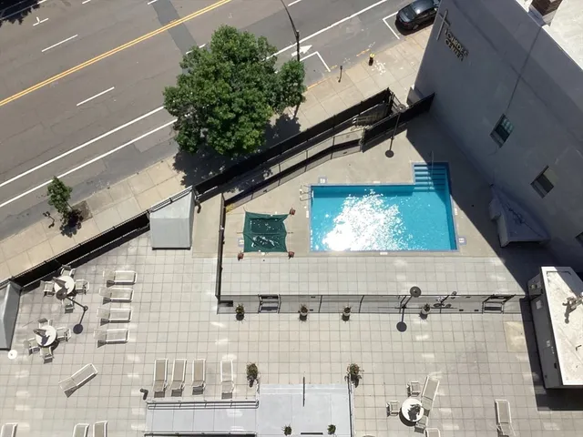 a picture of a bathroom with a shower