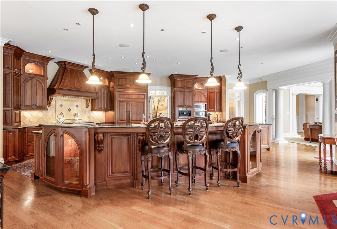 2725 Stonegate Court Midlothian, VA 23113 - Photo 15 of 50 a view of a dining hall with many windows