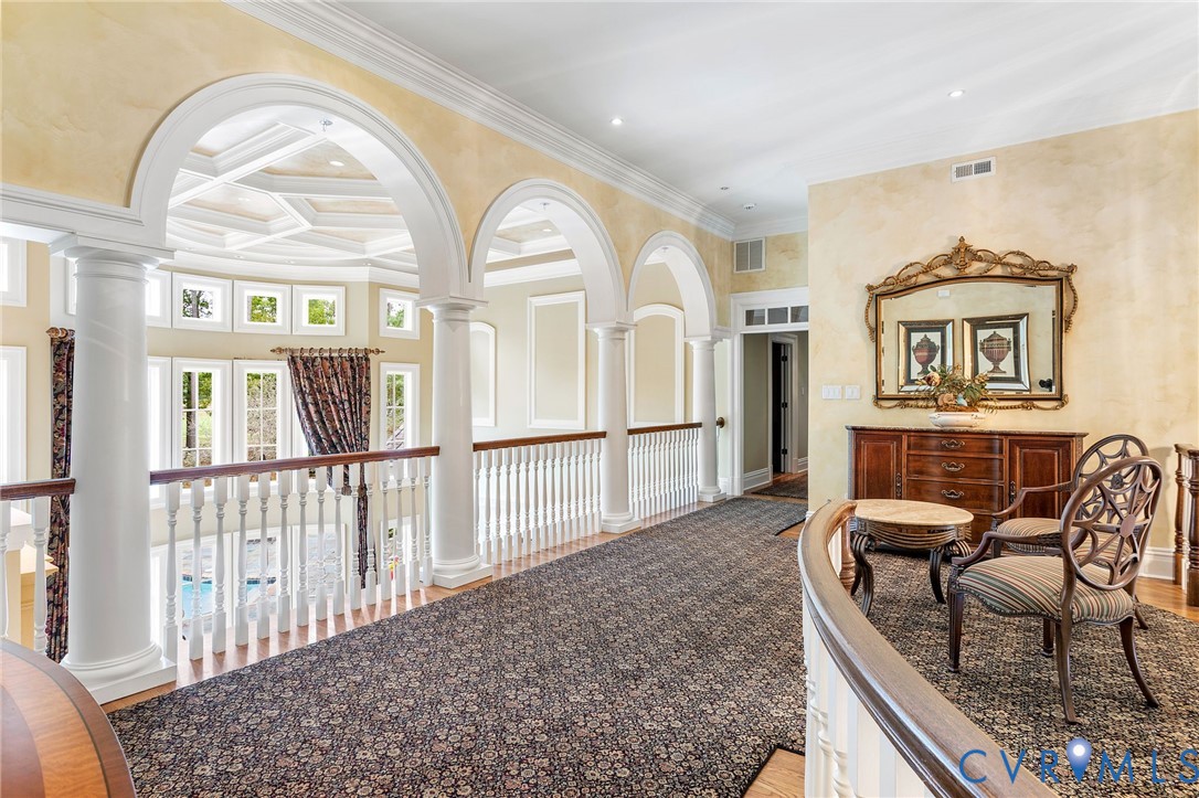 2725 Stonegate Court Midlothian, VA 23113 - Photo 31 of 50 a view of a livingroom with furniture wooden floor and windows