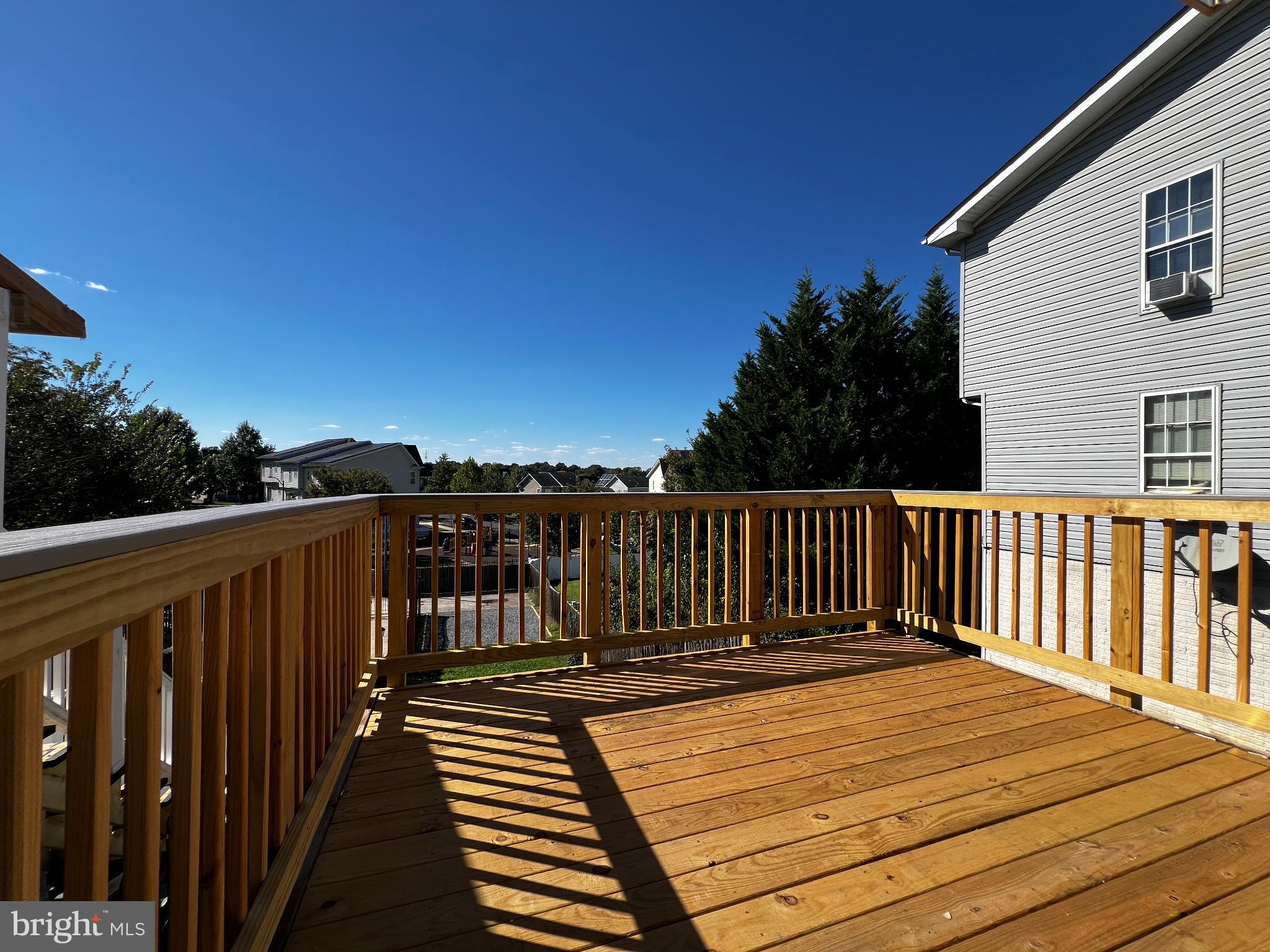 75 58th Street Southeast Washington, DC 20019 - Photo 17 of 40 Sunny deck with scenic neighborhood views.