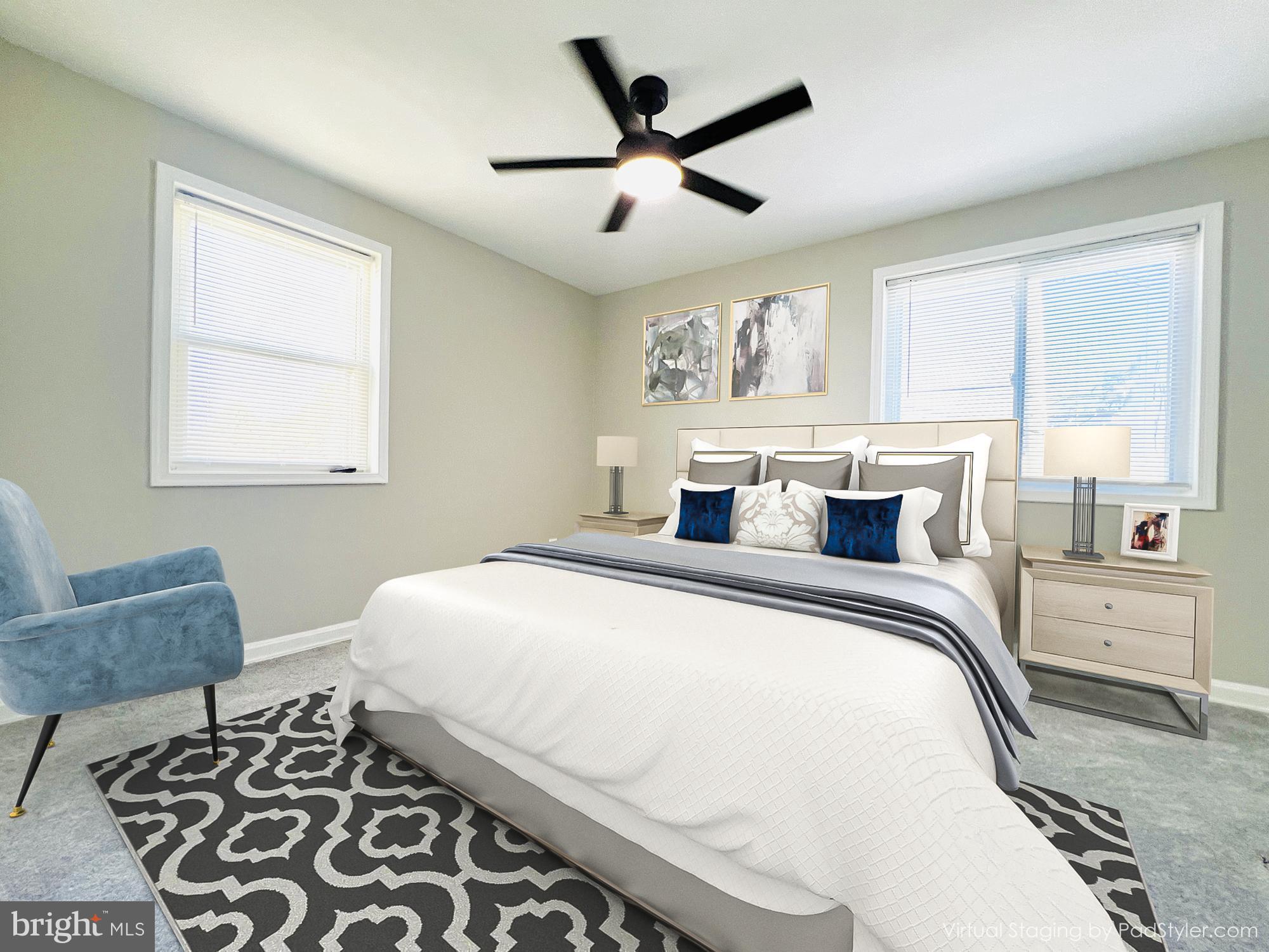 75 58th Street Southeast Washington, DC 20019 - Photo 6 of 40 a bedroom with a large bed and a window