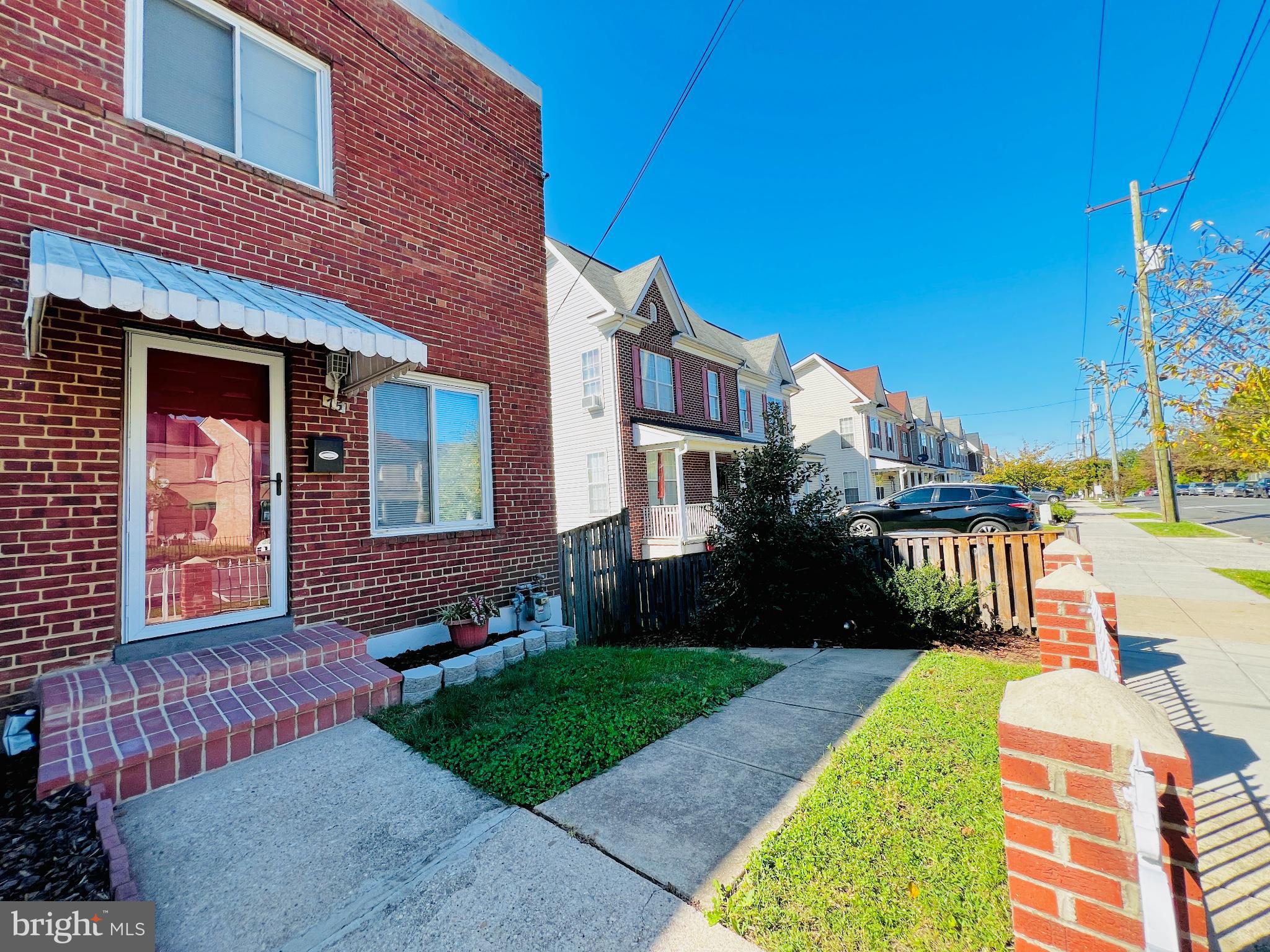 75 58th Street Southeast Washington, DC 20019 - Photo 9 of 40 a view of a building with a yard and plants