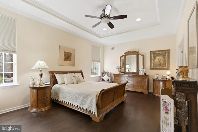 a bedroom with a bed and a view of bathroom