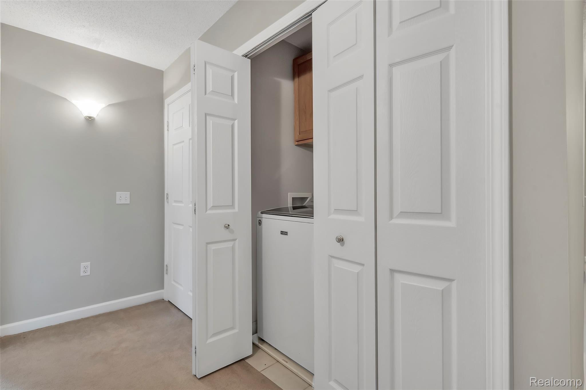 563 Gulley Road Howell, MI 48843 - Photo 37 of 49 2nd floor laundry