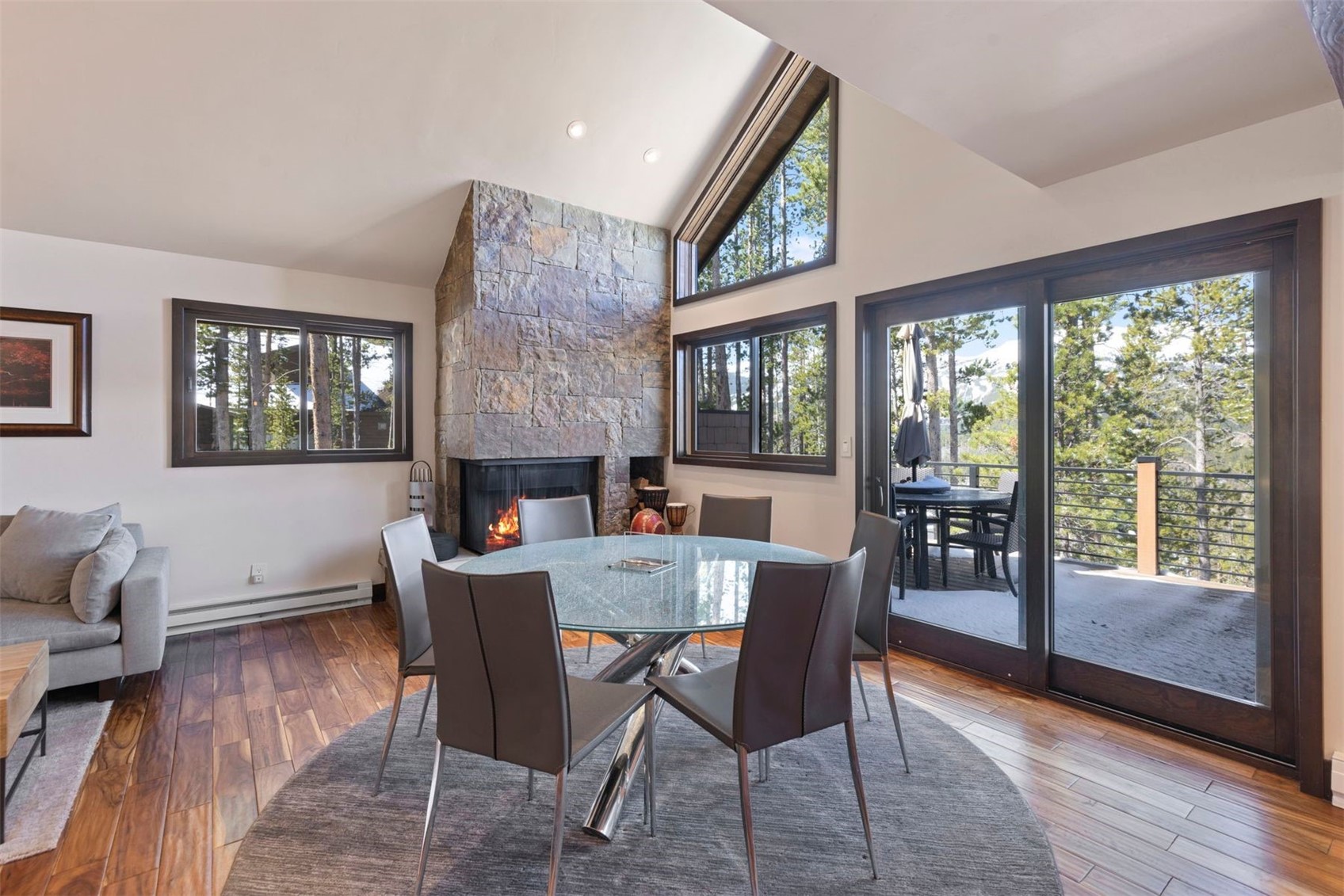 103 Bearing Tree Road Breckenridge, CO 80424 - Photo 10 of 30 a view of a dining room with furniture window and wooden floor