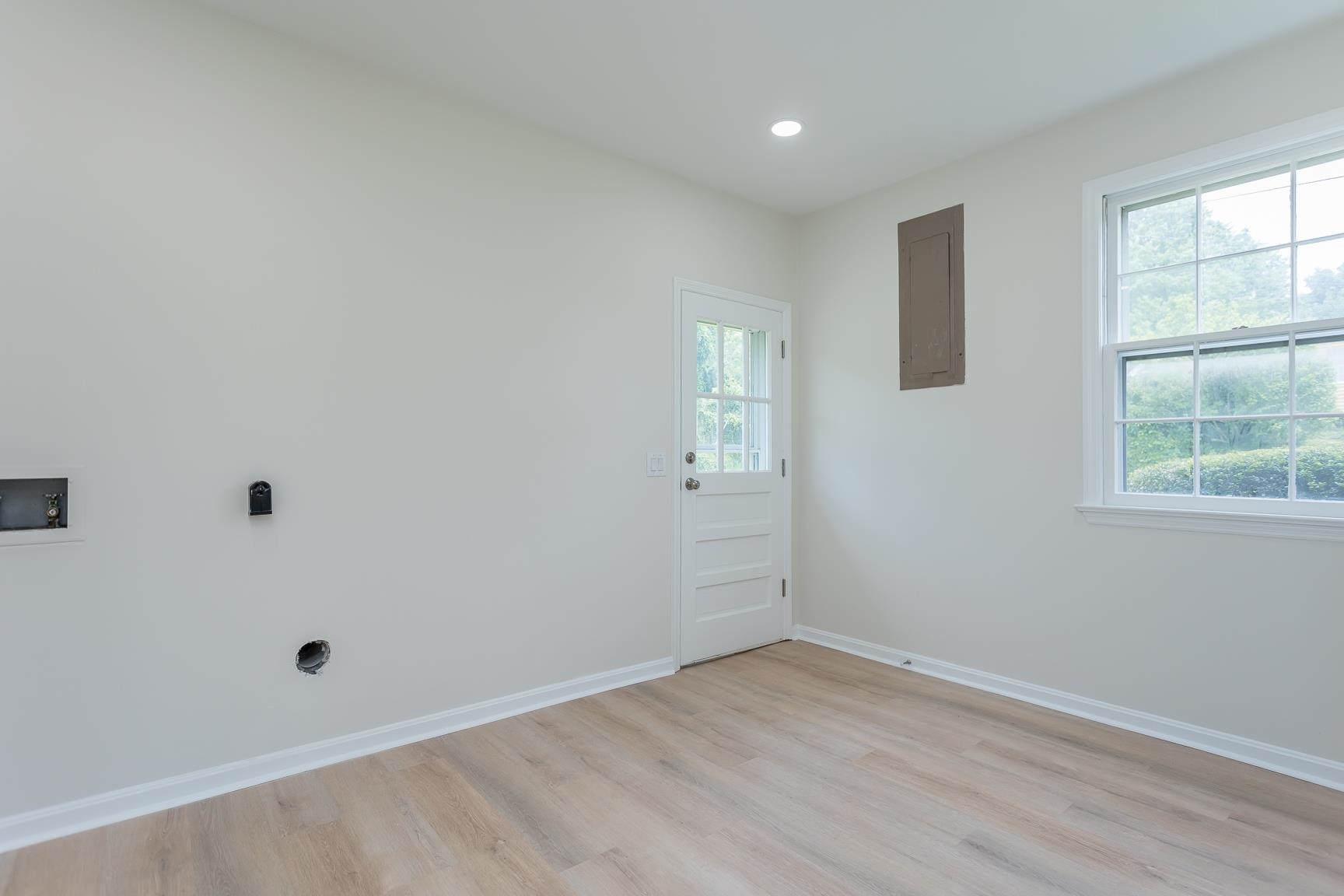 1002 North Coalter Street Staunton, VA 24401 - Photo 22 of 36 an empty room with a window