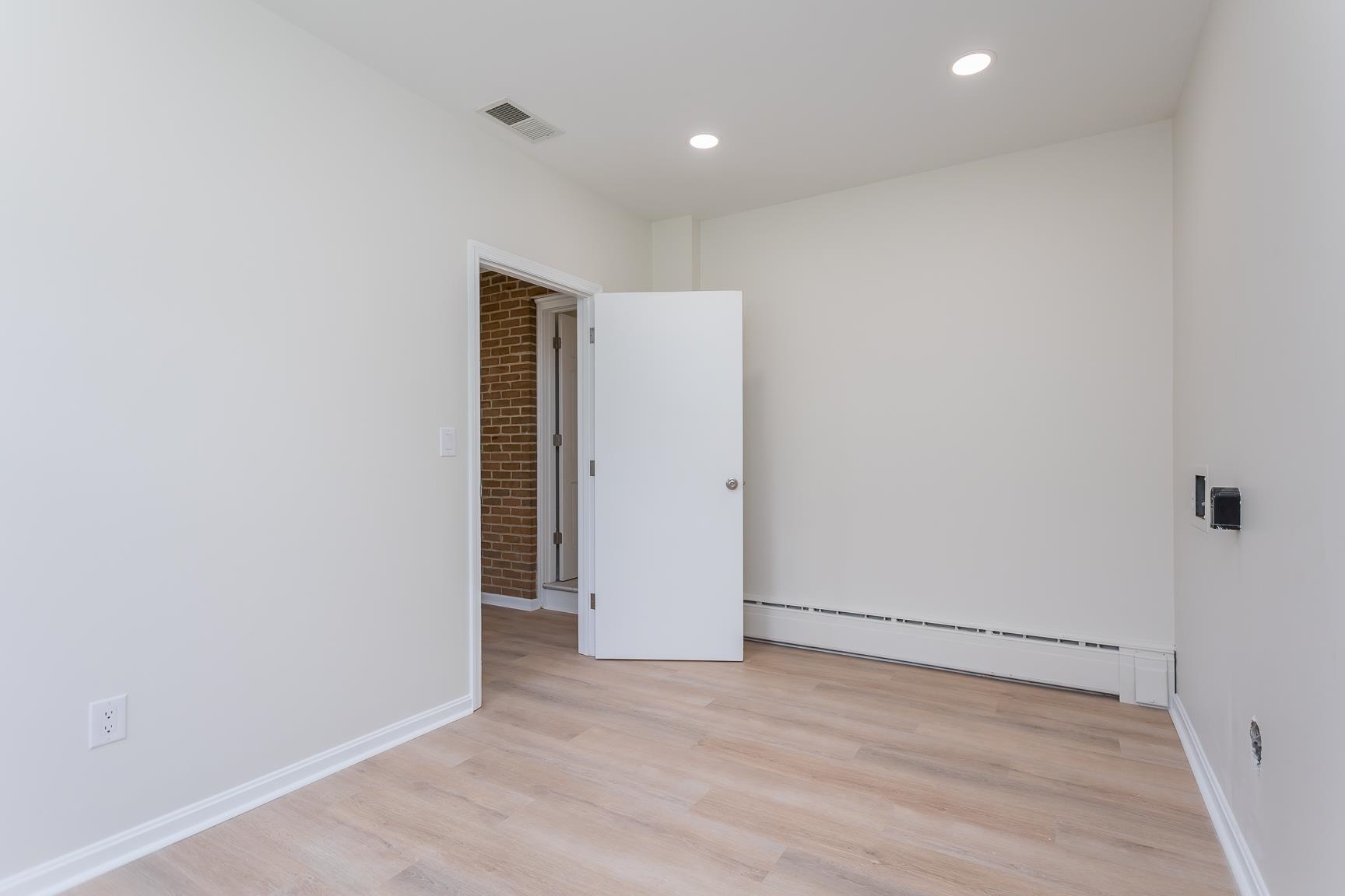 1002 North Coalter Street Staunton, VA 24401 - Photo 23 of 36 an empty room with wooden floor