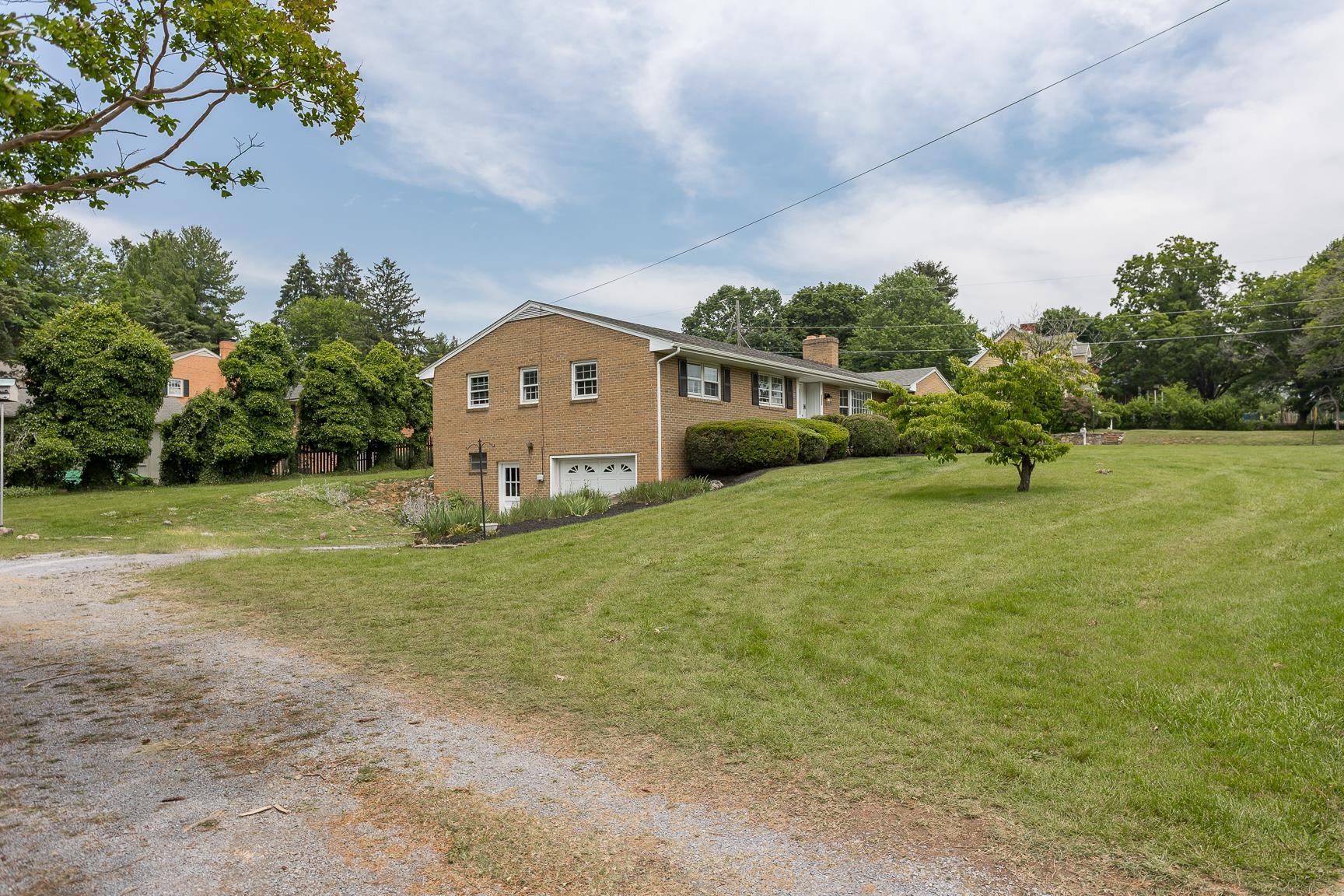 1002 North Coalter Street Staunton, VA 24401 - Photo 6 of 36 a view of an house with backyard and garden
