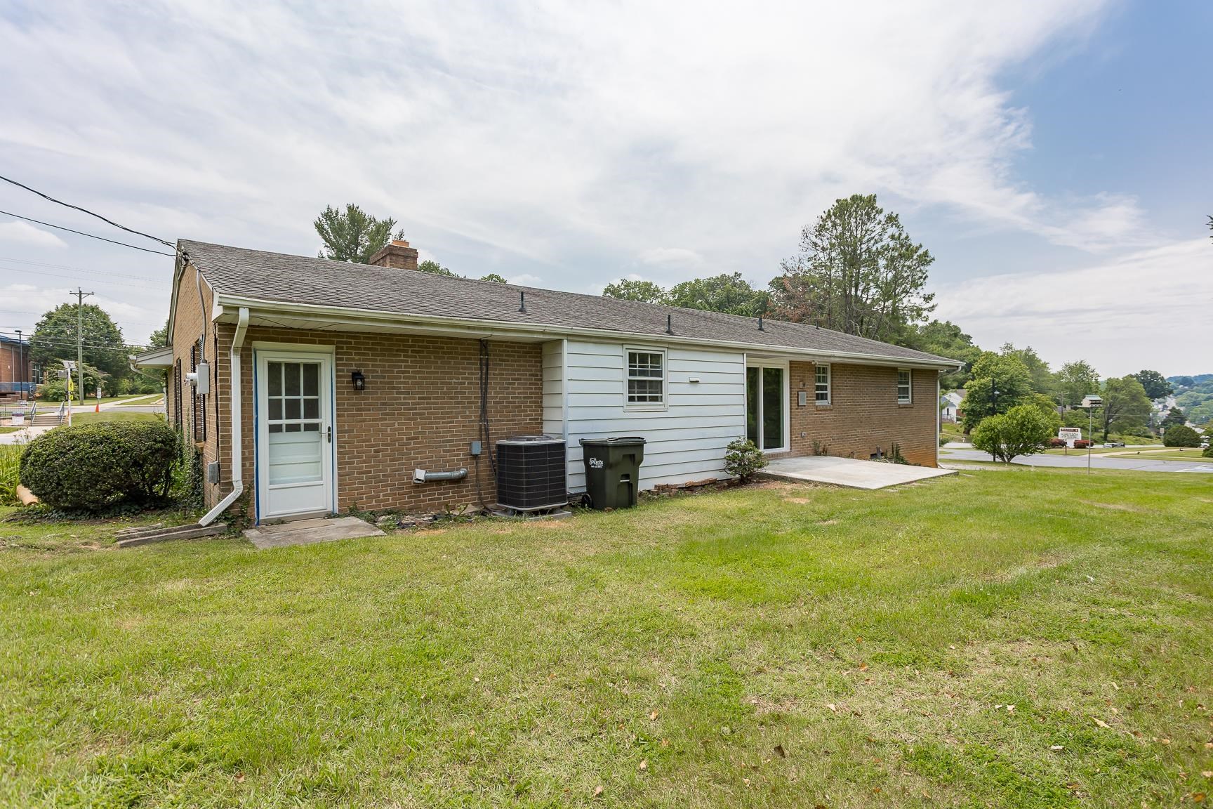 1002 North Coalter Street Staunton, VA 24401 - Photo 8 of 36 a view of a house with backyard porch and garden