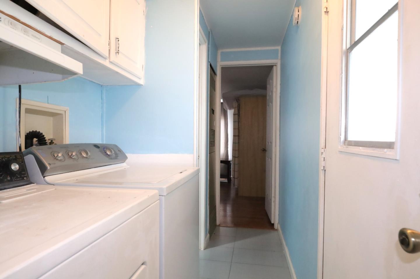 60 Wilson Way, Unit 150 Milpitas, CA 95035 - Photo 11 of 12 a utility room with dryer and washer