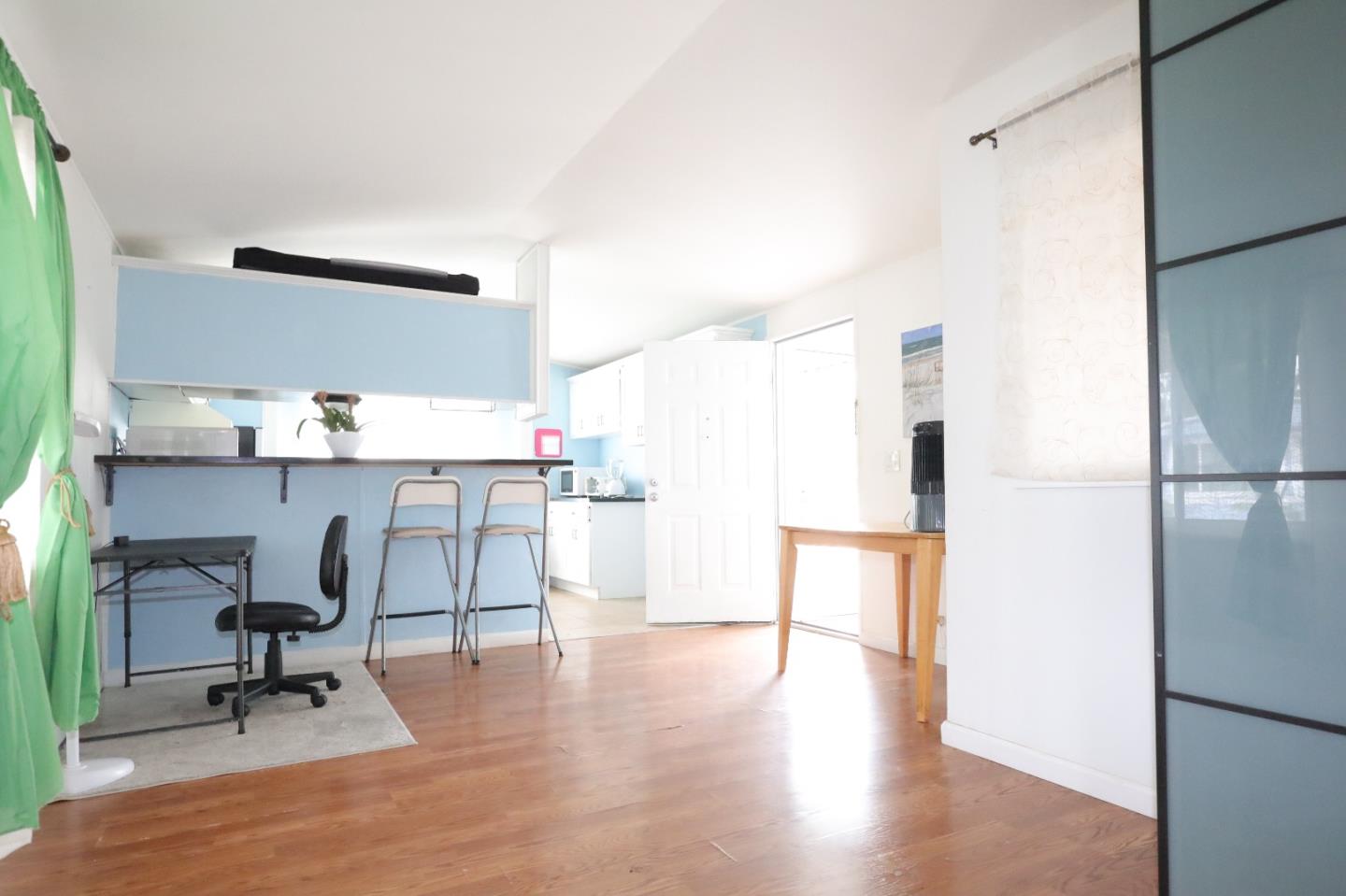 60 Wilson Way, Unit 150 Milpitas, CA 95035 - Photo 4 of 12 a view of a workspace with furniture and a window