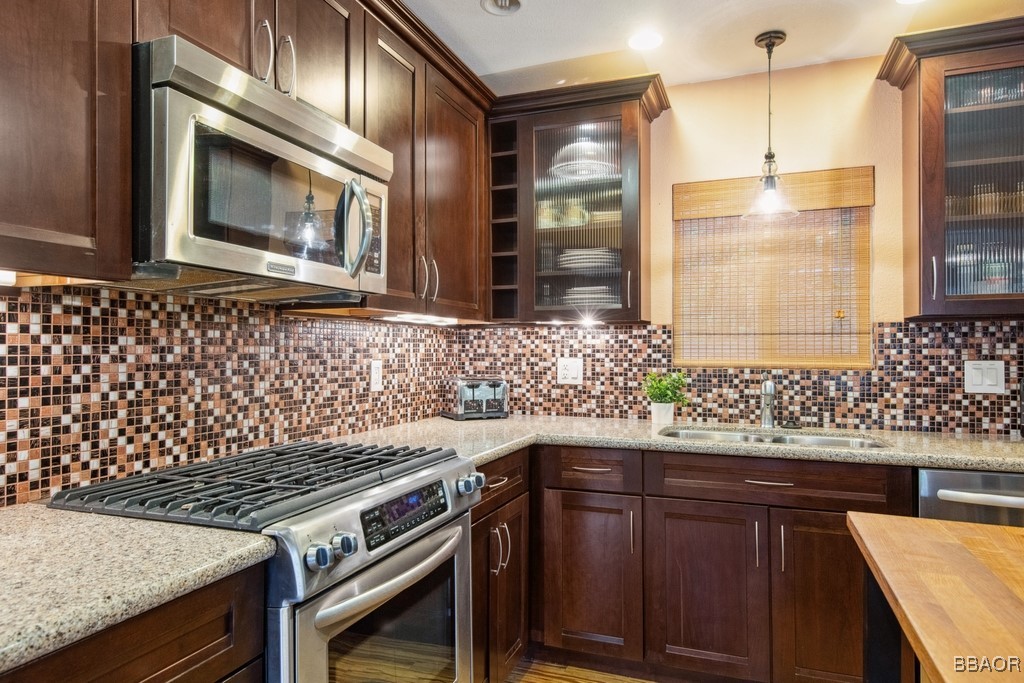 23697 Bowl Road Crestline, CA 92325 - Photo 12 of 28 a kitchen with a stove and a sink
