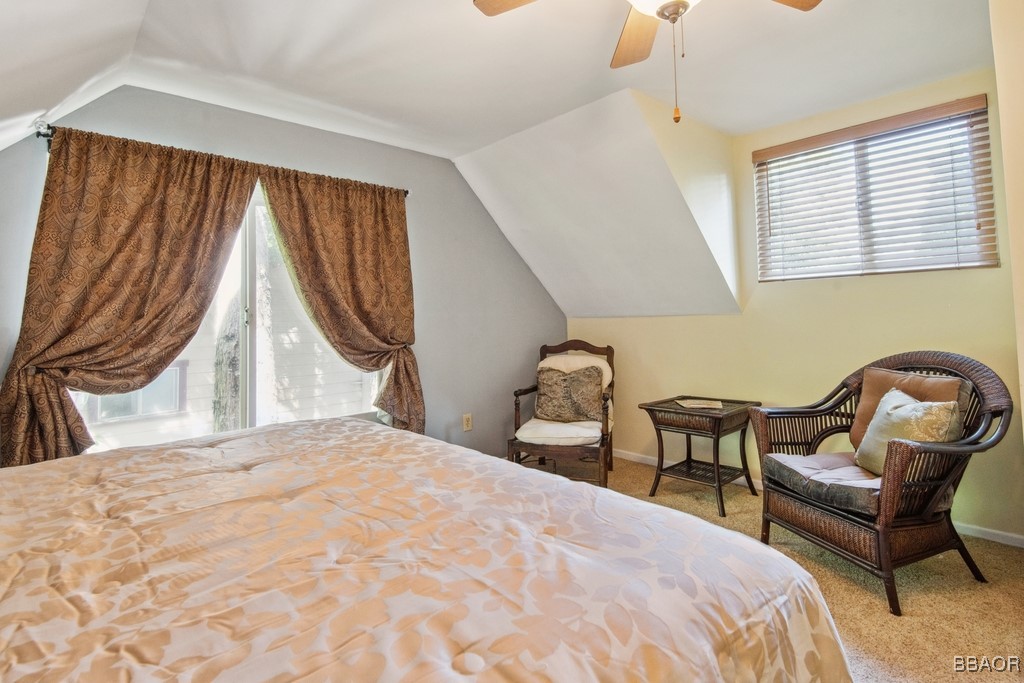 23697 Bowl Road Crestline, CA 92325 - Photo 21 of 28 a bedroom with a bed chair and window