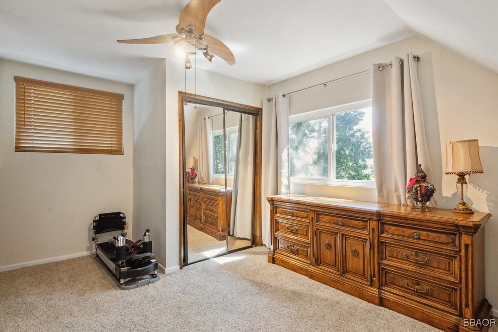 23697 Bowl Road Crestline, CA 92325 - Photo 23 of 28 a living room with furniture and a window