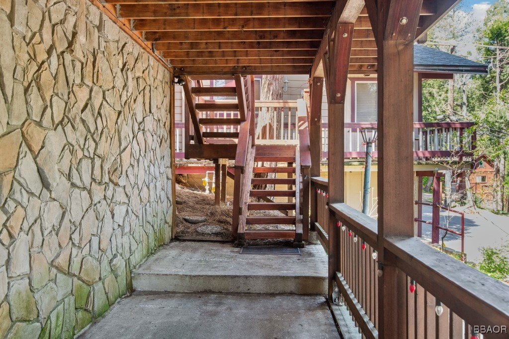 23697 Bowl Road Crestline, CA 92325 - Photo 4 of 28 a view of stairs and wooden floor