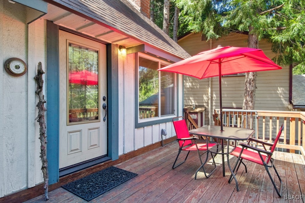 23697 Bowl Road Crestline, CA 92325 - Photo 5 of 28 a view of balcony with furniture and wooden deck