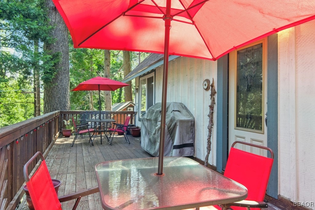 23697 Bowl Road Crestline, CA 92325 - Photo 6 of 28 a view of balcony with a patio and wooden deck