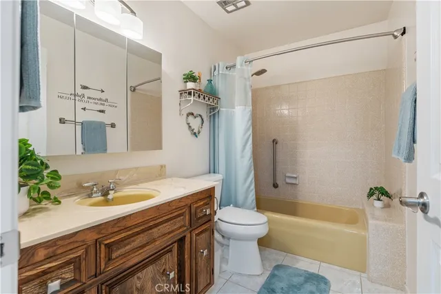 a bathroom with a sink a toilet and a bathtub