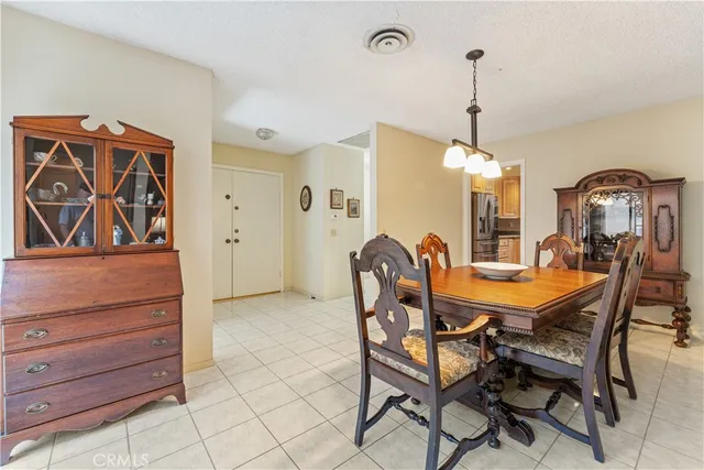 a view of a dining room and chairs