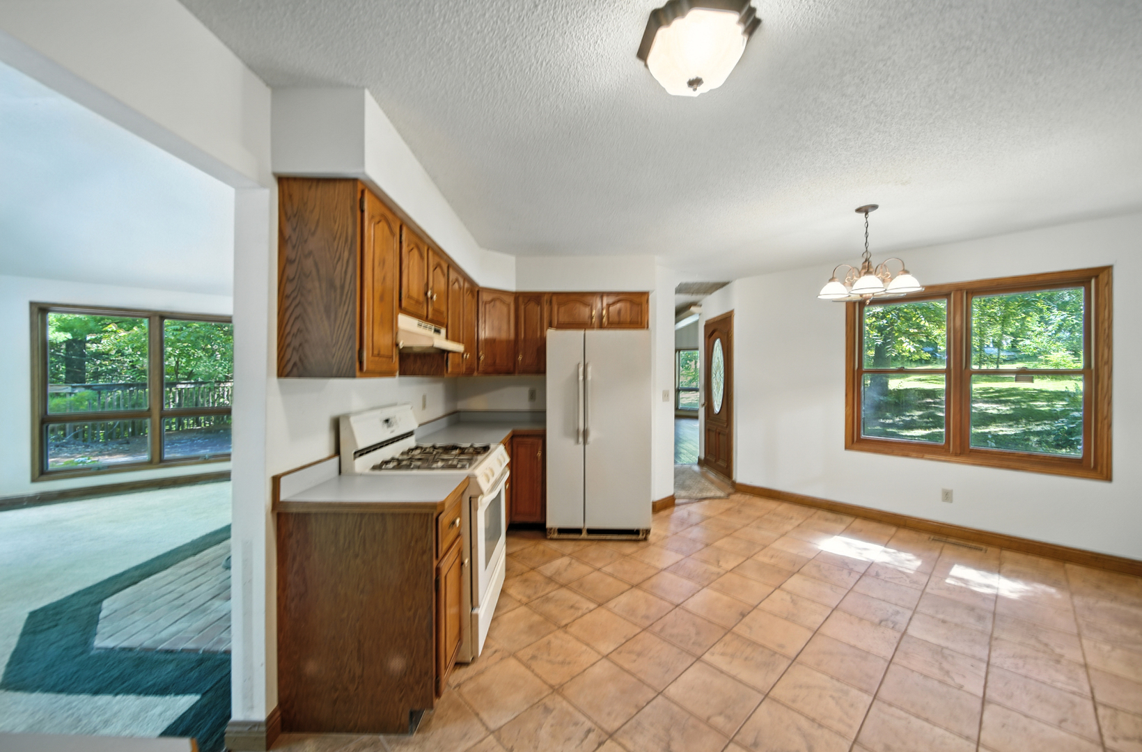 21631 Hoover Road Sterling, IL 61081 - Photo 18 of 30 a kitchen that has a sink and a stove