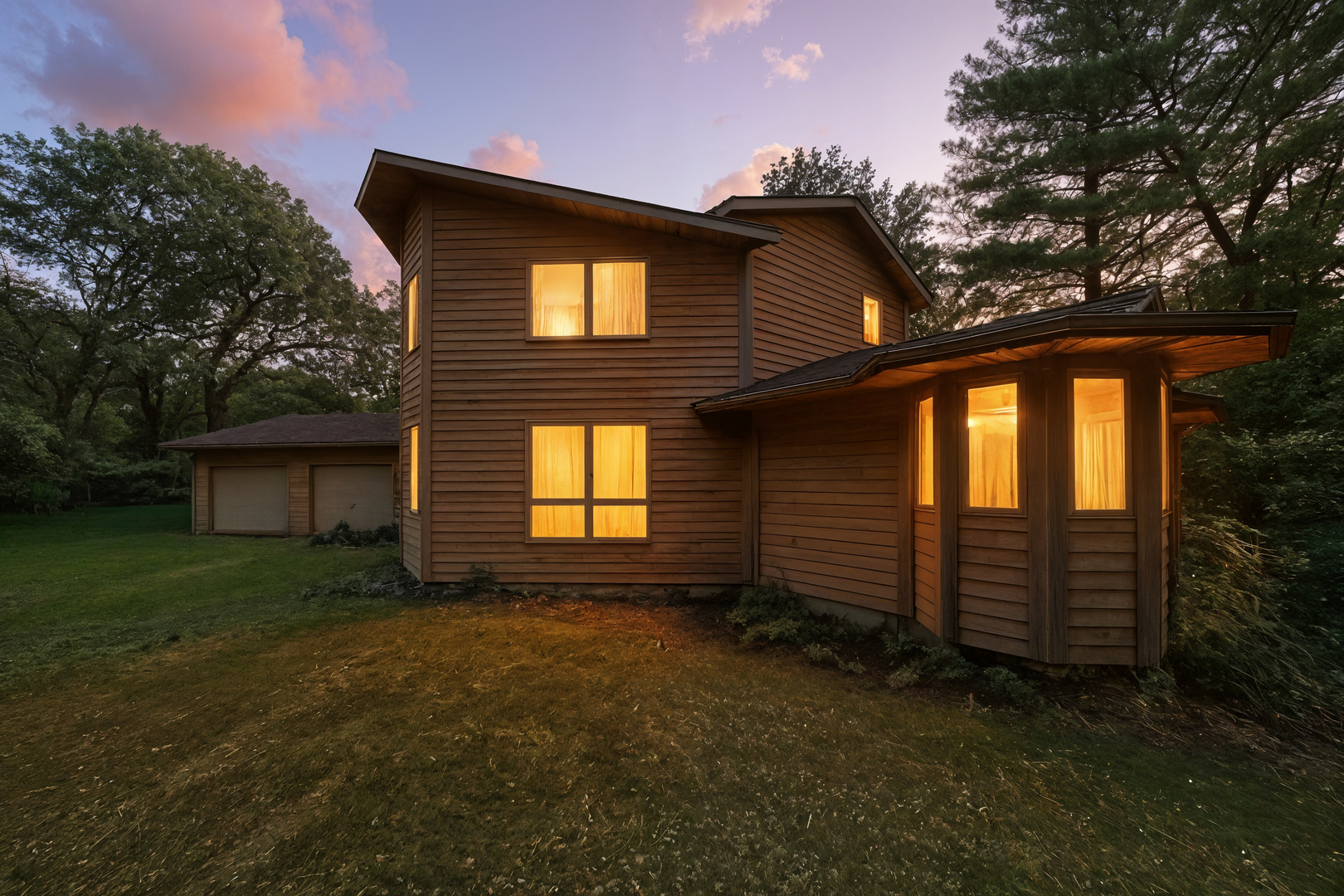 21631 Hoover Road Sterling, IL 61081 - Photo 2 of 30 a front view of a house with a yard