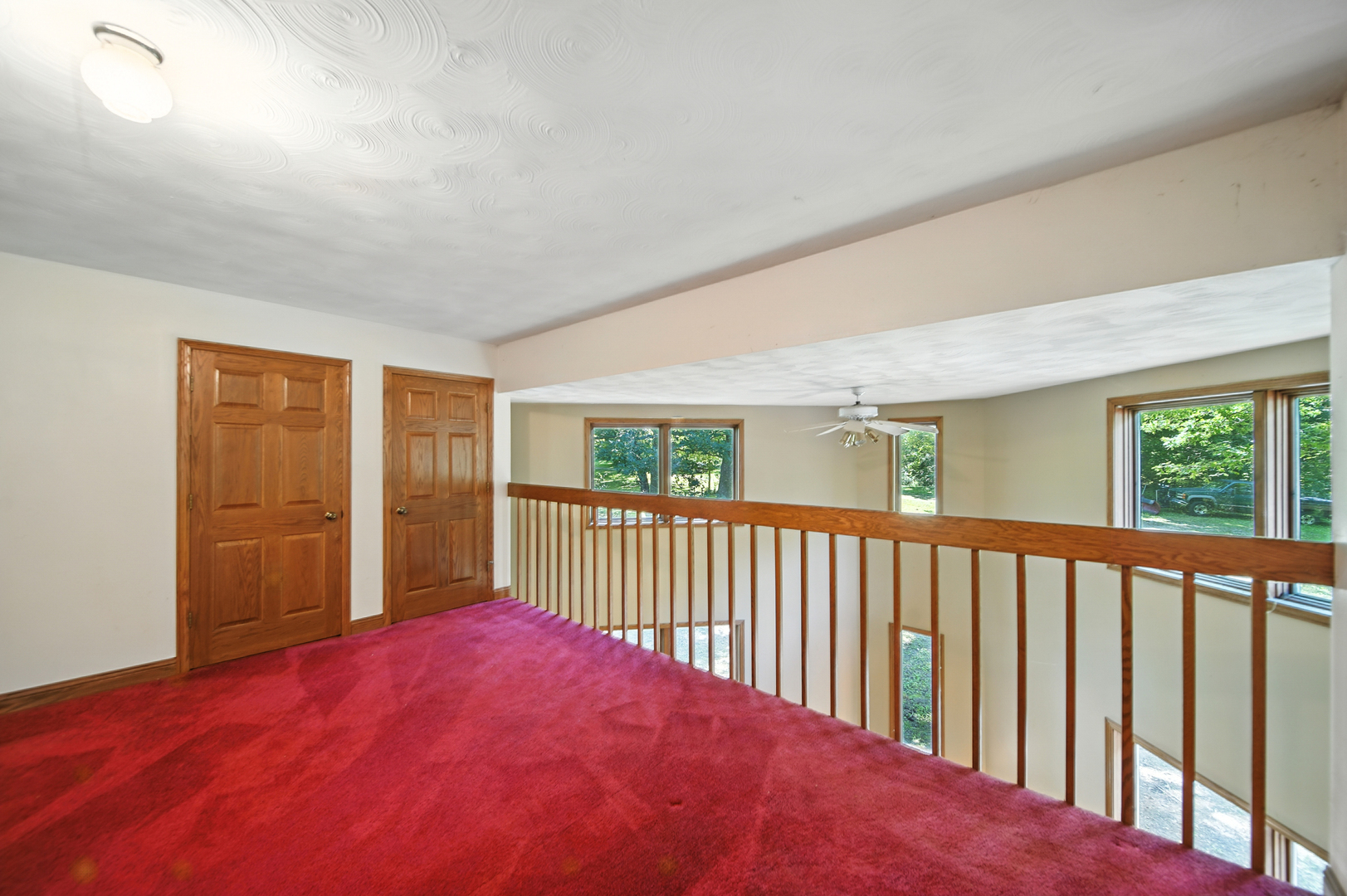 21631 Hoover Road Sterling, IL 61081 - Photo 21 of 30 a view of a bedroom with wooden floor