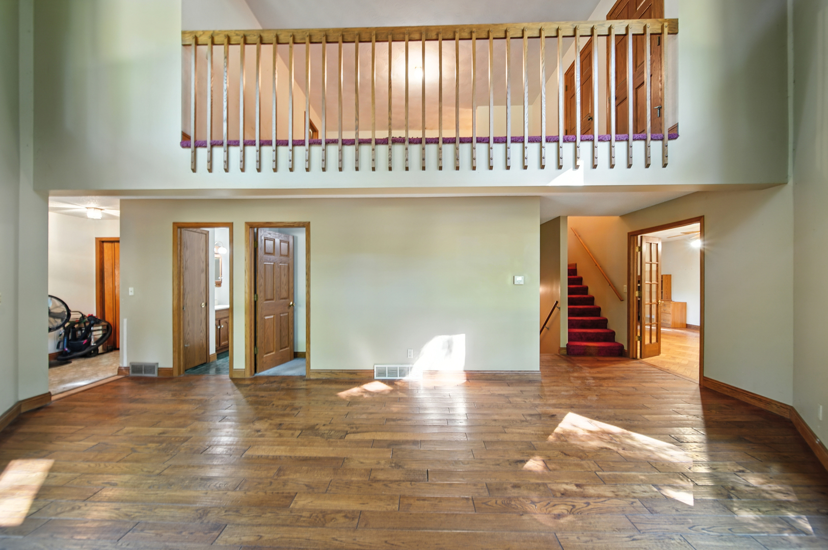 21631 Hoover Road Sterling, IL 61081 - Photo 9 of 30 a view of a livingroom with furniture and staircase