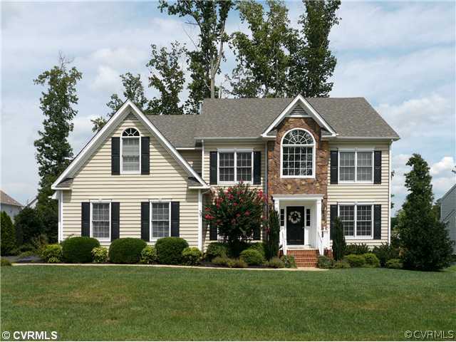 1207 Goswick Ridge Road Midlothian, VA 23114 - Photo 1 of 12 a front view of a house with a yard