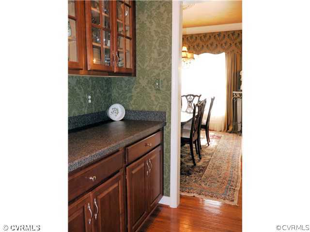 1207 Goswick Ridge Road Midlothian, VA 23114 - Photo 7 of 12 a view of a bathroom with a sink and a mirror