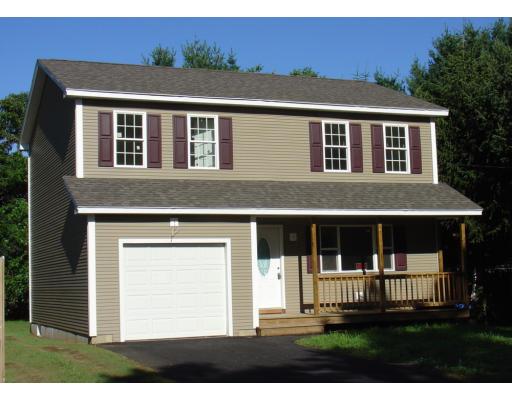 92 Avery Street Springfield, MA 01119 - Photo 1 of 4 a front view of a house with a yard