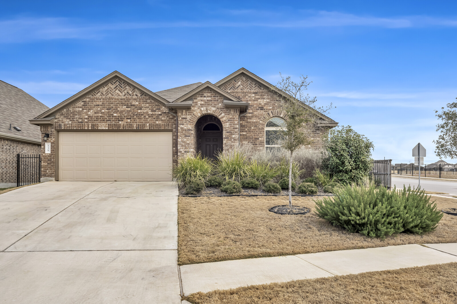 539 Merlin Lane Leander, TX 78641 - Photo 1 of 18 a view of a house with a small yard