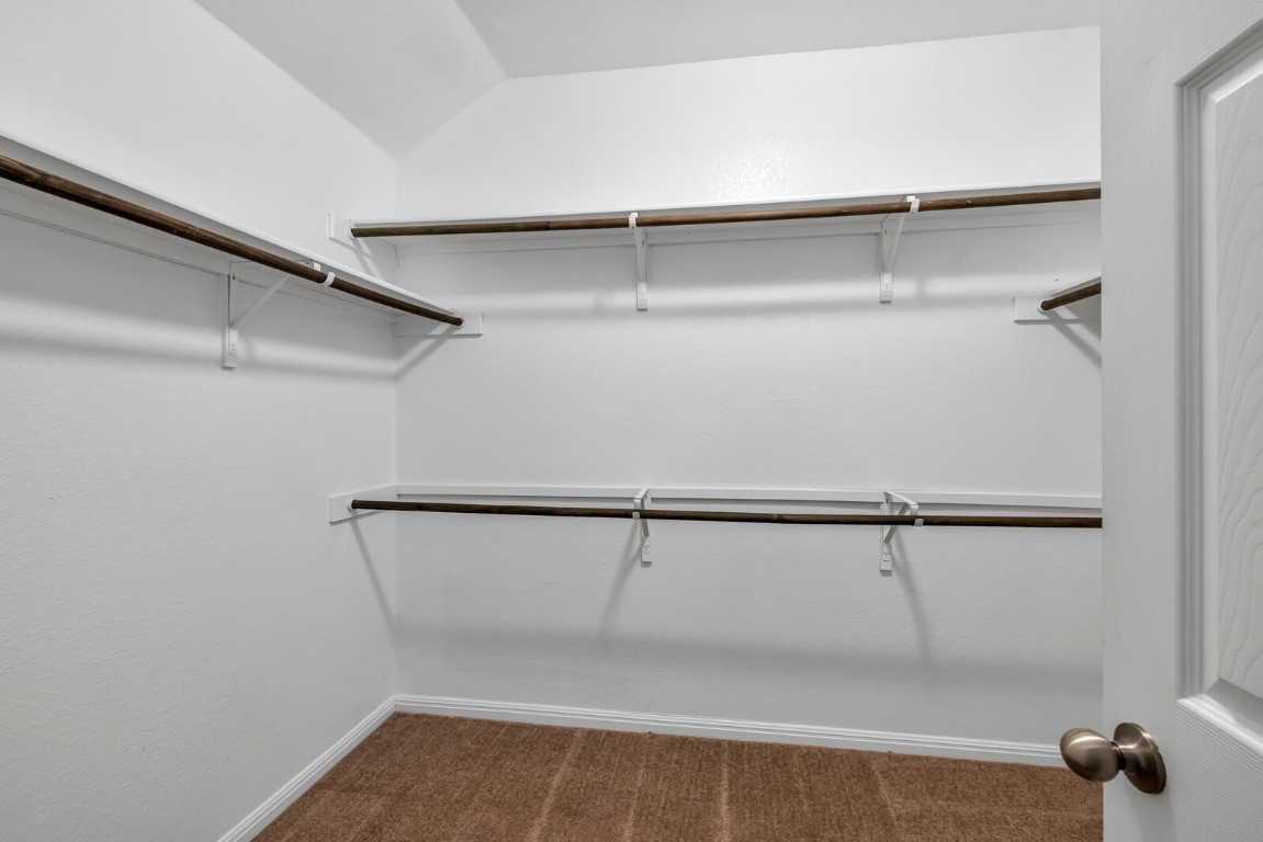 539 Merlin Lane Leander, TX 78641 - Photo 14 of 18 Spacious closet featuring carpet flooring