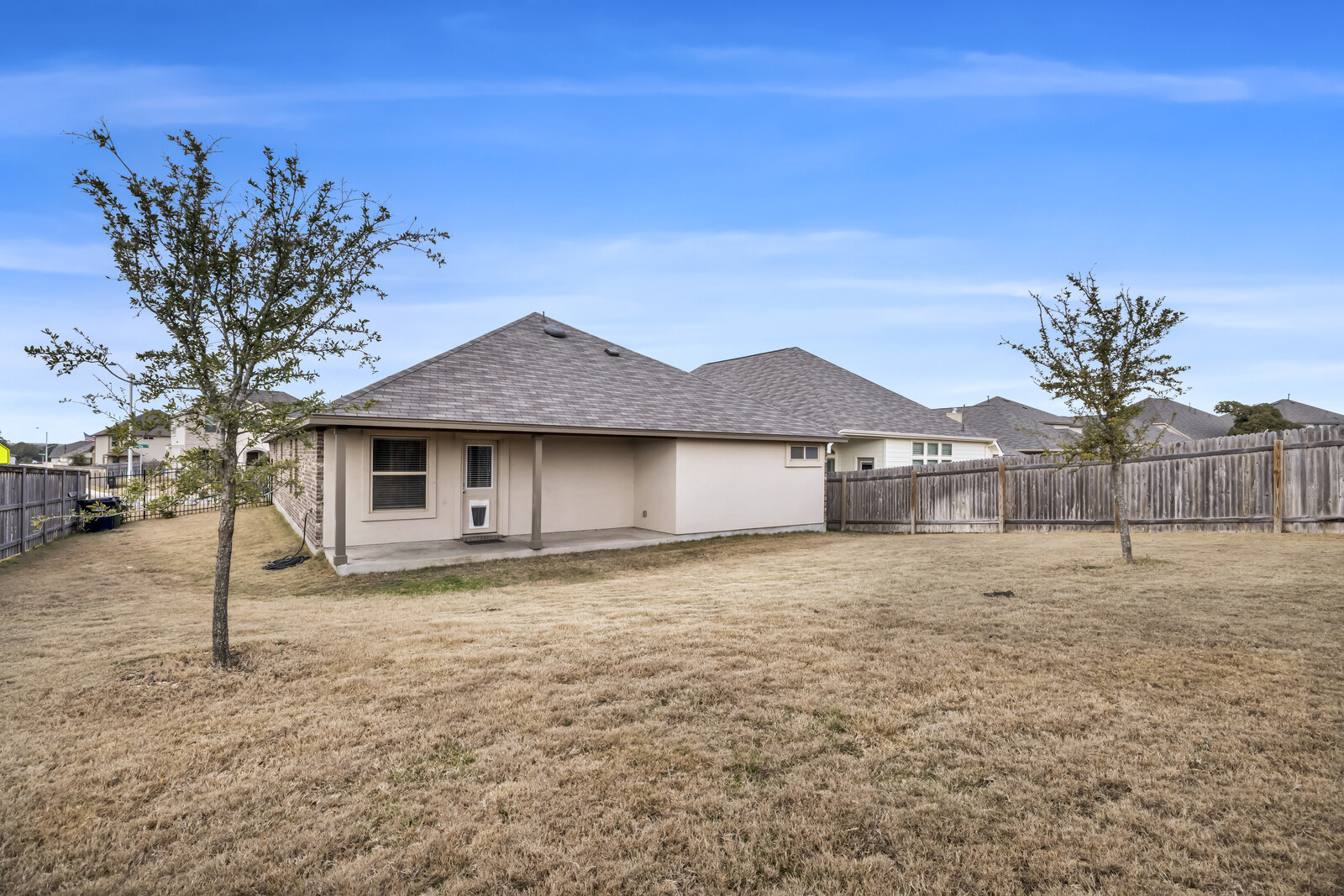 539 Merlin Lane Leander, TX 78641 - Photo 18 of 18 a front view of a house with a yard