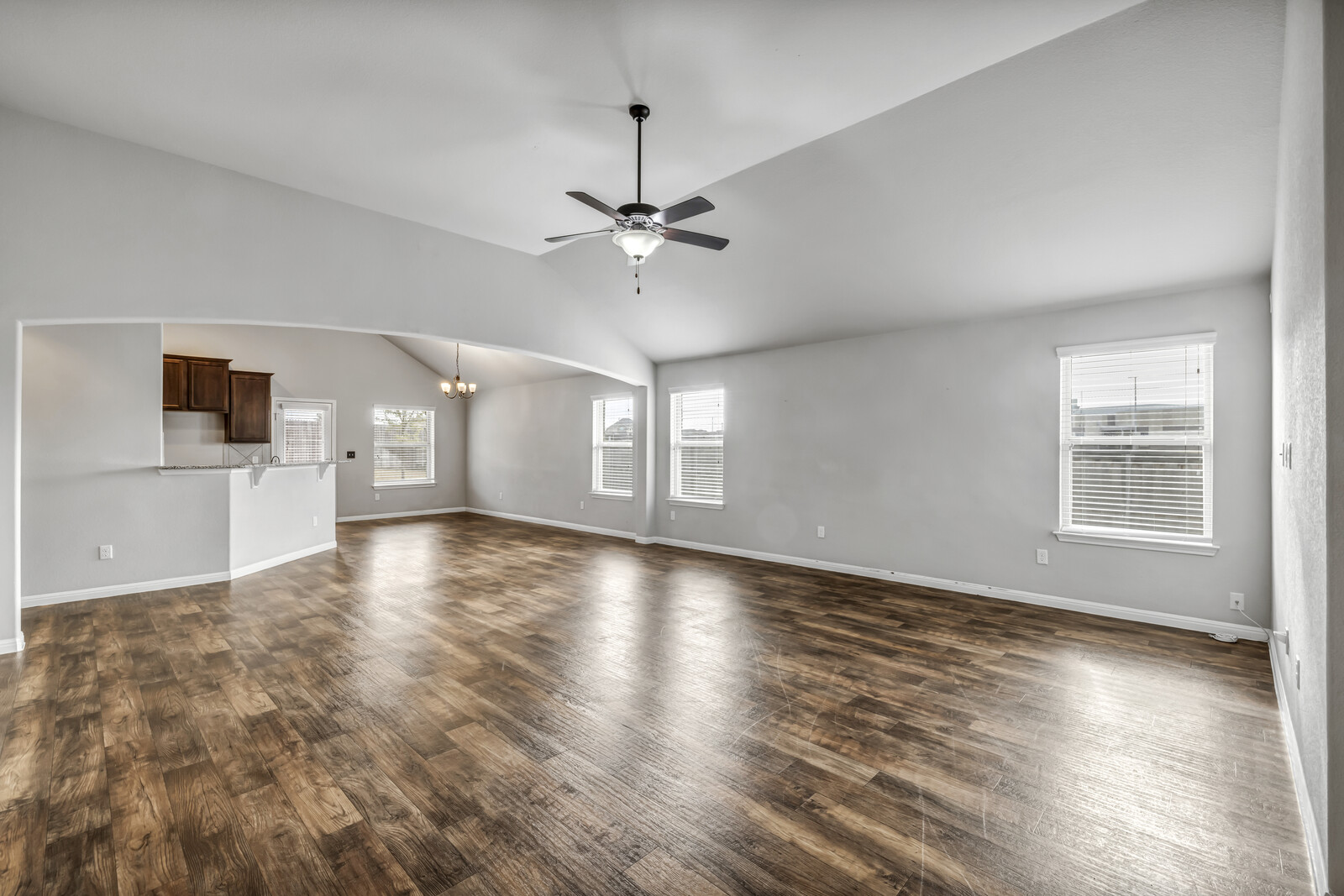 539 Merlin Lane Leander, TX 78641 - Photo 5 of 18 wooden floor in an empty room with a window