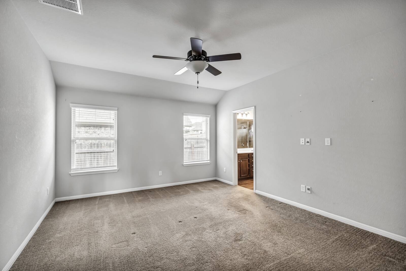 539 Merlin Lane Leander, TX 78641 - Photo 9 of 18 a view of an empty room with a window