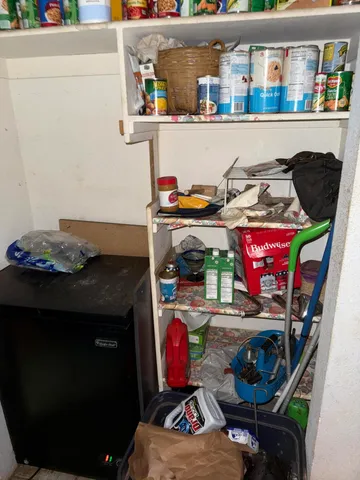 a room with storage and utility