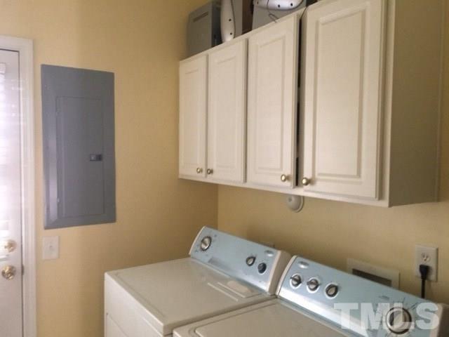 7010 Mead Lane Raleigh, NC 27613 - Photo 21 of 22 a utility room with dryer and washer