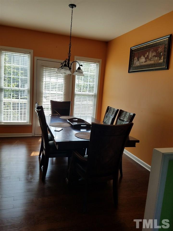 7010 Mead Lane Raleigh, NC 27613 - Photo 22 of 22 a view of a workspace with furniture and a window