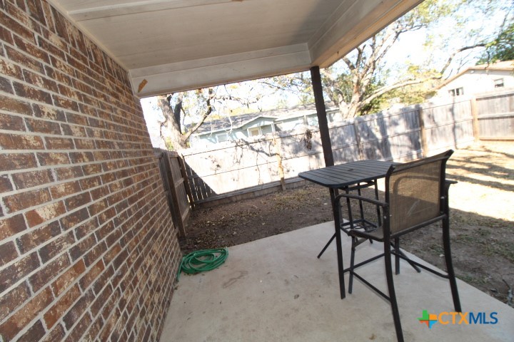 911 Brookview Drive, Unit A Copperas Cove, TX 76522 - Photo 13 of 13 a view of a porch with furniture and a yard