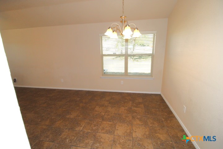 911 Brookview Drive, Unit A Copperas Cove, TX 76522 - Photo 4 of 13 a view of an empty room with a window