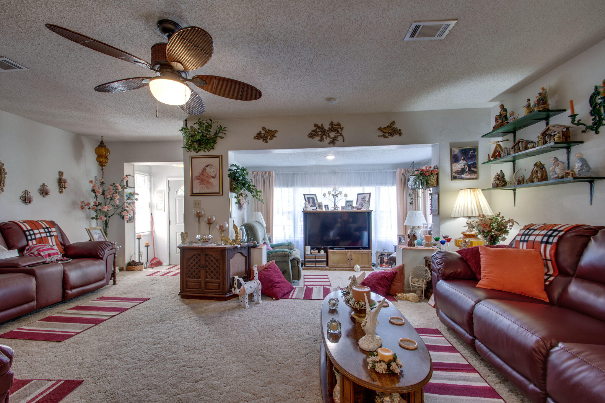 333 Edge Avenue Valparaiso, FL 32580 - Photo 11 of 37 a living room with furniture and a fireplace