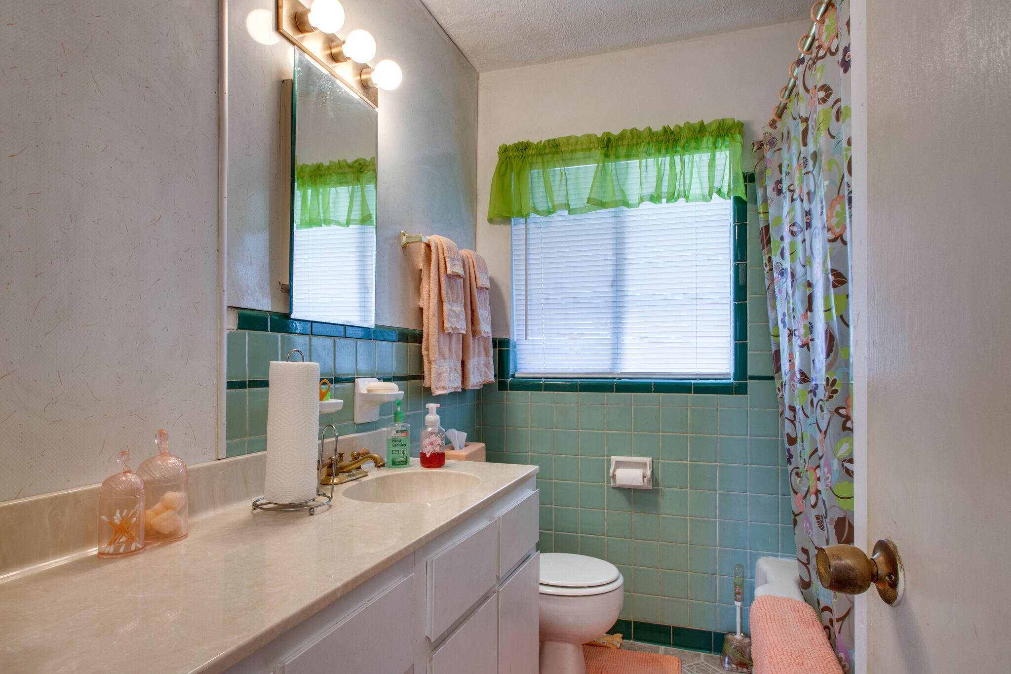 333 Edge Avenue Valparaiso, FL 32580 - Photo 21 of 37 a bathroom with a sink toilet and window