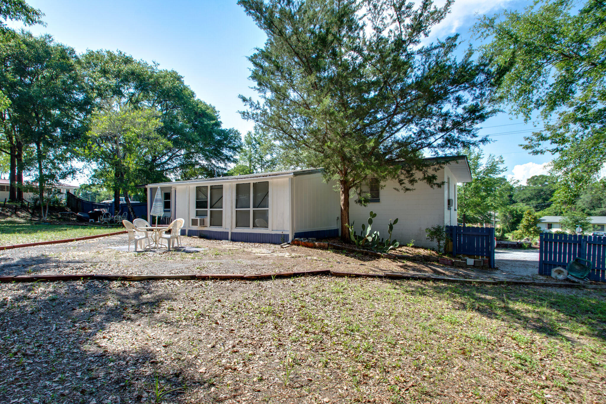 333 Edge Avenue Valparaiso, FL 32580 - Photo 30 of 37 a view of a backyard with a tree