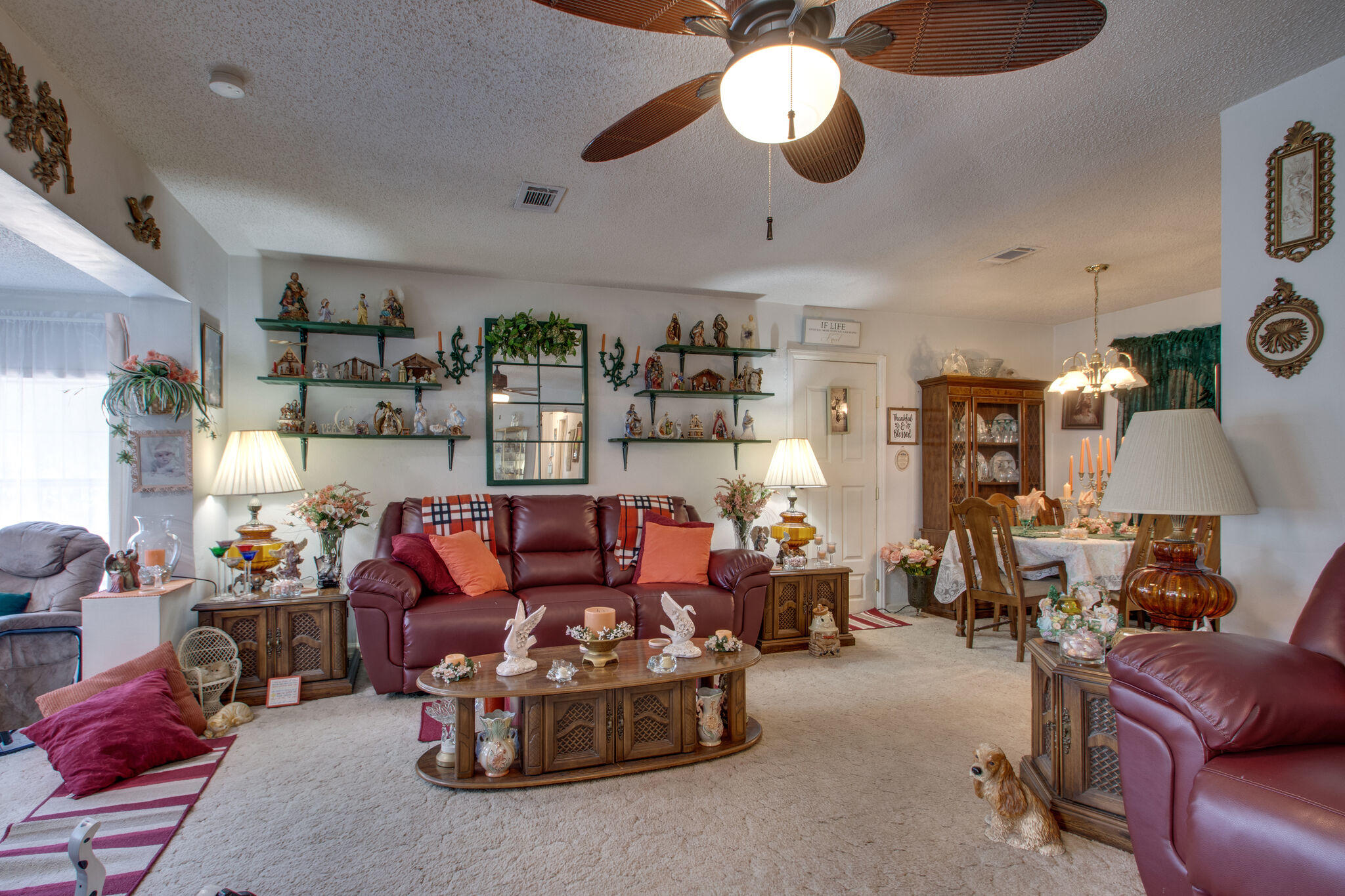 333 Edge Avenue Valparaiso, FL 32580 - Photo 9 of 37 a living room with lots of furniture and a chandelier