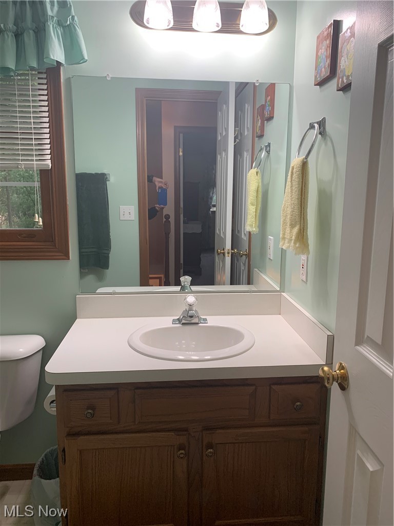 9046 Shepard Road Macedonia, OH 44056 - Photo 26 of 33 Hall bathroom with single vanity and combo shower/tub.